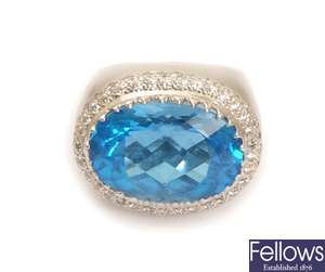 A large blue topaz and diamond cluster ring,
