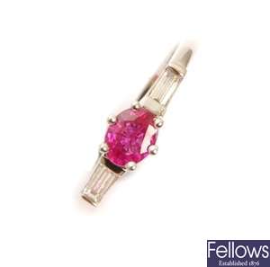 An 18ct white gold three stone ruby and diamond