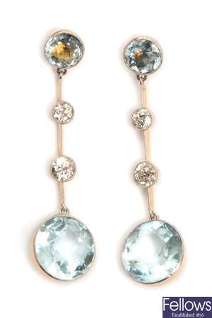 A pair of diamond and aquamarine dropper earrings