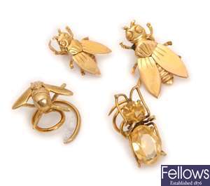 Four bug design lapel pins, to include a 9ct gold