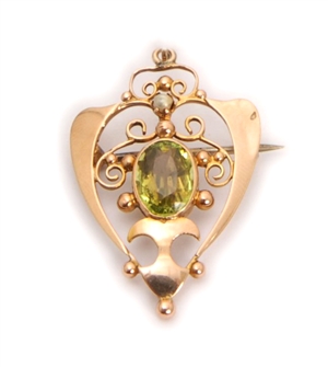 An Edwardian pendant with seed pearl and central