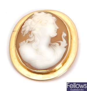 An oval shell cameo brooch depicting diana the