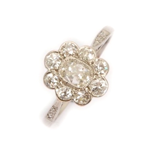 A platinum mounted diamond cluster ring,