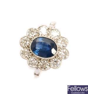 A sapphire and diamond cluster ring, comprising