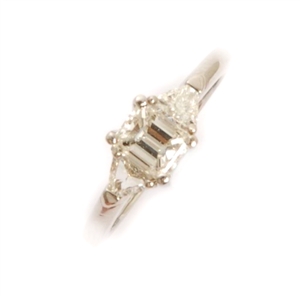 A platinum mounted three stone diamond ring,