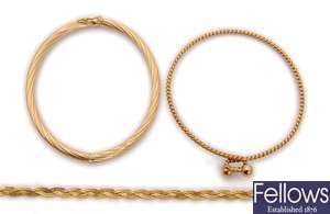 A collection of 9ct gold chains, bangles and