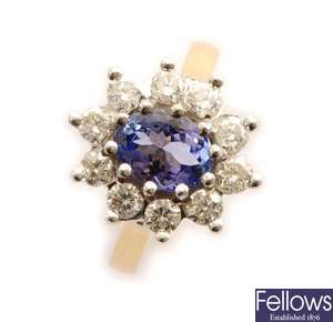 An 18ct gold tanzanite and diamond cluster ring