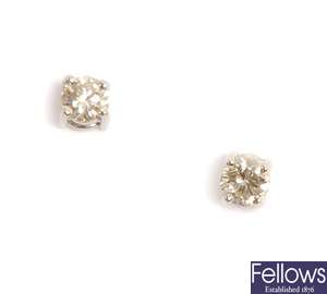 A pair of 18ct white gold single stone round