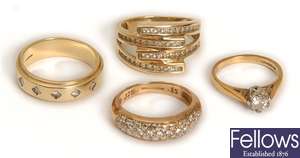 Four rings, to include a 9ct gold band ring, with