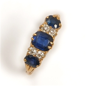 An early 20th century sapphire and diamond carved