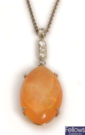A fire opal and diamond pendant, comprising a