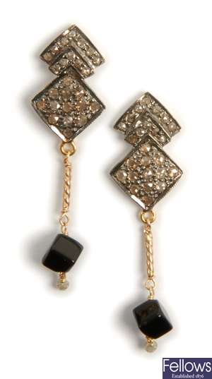 A pair of diamond and onyx dropper earrings,