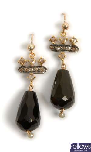 A pair of onyx and diamond dropper earrings, with