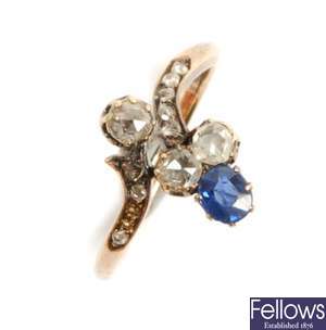 A sapphire and diamond twist design up finger