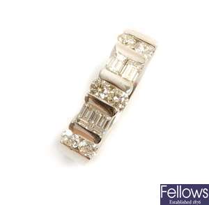 A diamond set band ring, comprising three tension