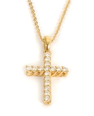 An 18ct gold round brilliant diamond cross