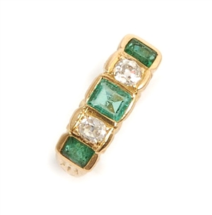 A five stone emerald and diamond ring, with three