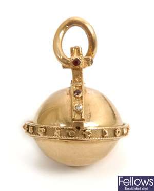 A 9ct gold hinged orb pendant, with alternate set