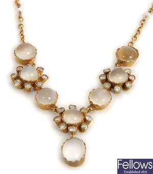 An ornate moonstone and diamond necklace,