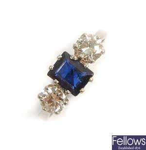 A platinum mounted three stone sapphire and