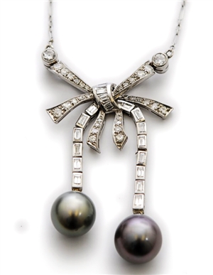A mid 20th century diamond and cultured pearl set