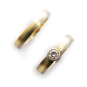 Two rings, to include an 18ct bi-colour gold