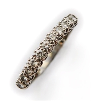 A diamond set half eternity ring, comprising