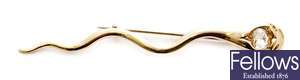 A Victorian 18ct gold snake design brooch, with a