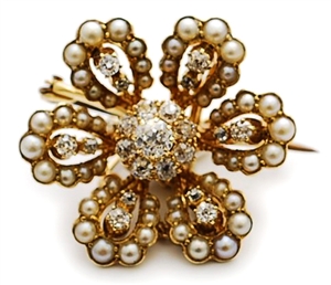An Edwardian diamond and split pearl floral