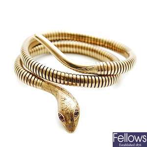 A 9ct gold snake bracelet, with a coiled flexible