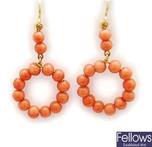 A pair of coral set earrings, comprising a coral