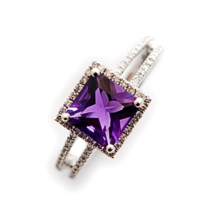 An 18ct white gold amethyst and diamond cluster