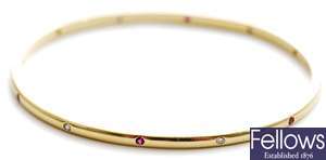 Theo Fennell - An 18ct gold diamond and ruby set