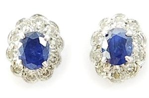 A pair of sapphire and diamond cluster stud