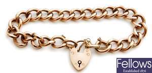 A 9ct rose gold curb link bracelet with padlock