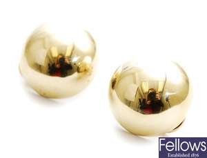 A pair of hollow circular sphere design clip on