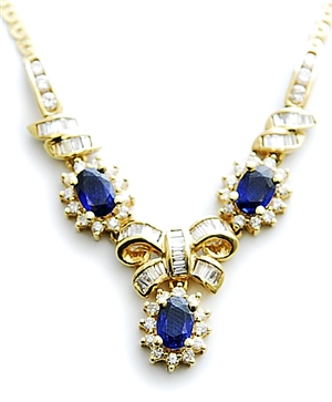 A Continental diamond and sapphire set necklet,