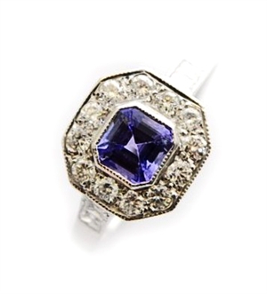 A tanzanite and diamond cluster ring, comprising