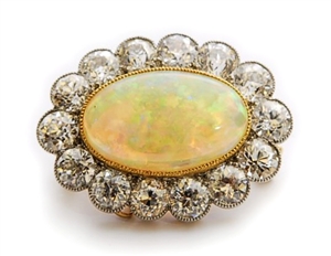 A mid 20th century opal and diamond cluster