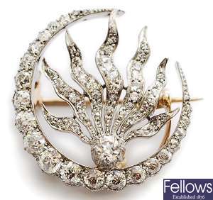 A Victorian diamond set crescent and flame