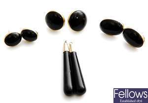 Four pairs of onyx set earrings, to include two