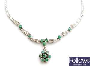An emerald set necklace, comprising a central