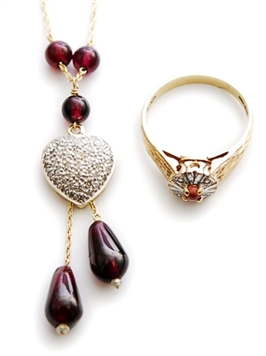 Two items, to include a 9ct gold garnet and