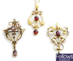 Three early 20th century pendants, to include a