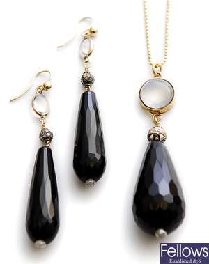 Two items to include a pair of moonstone, onyx
