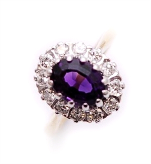 An 18ct gold amethyst and diamond cluster ring,