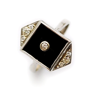 A diamond and onyx set ring, comprising a square