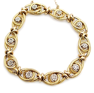 A French diamond set bracelet comprising ten