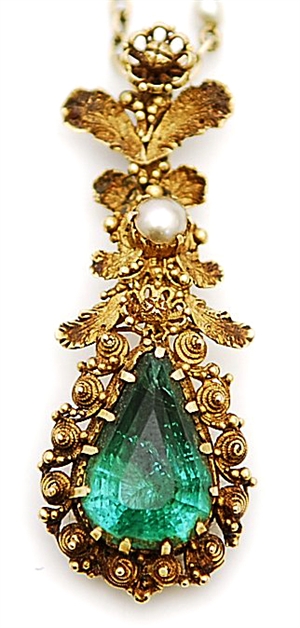 An early 19th century pear shaped emerald pendant