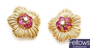 A pair of French ruby and diamond set flower